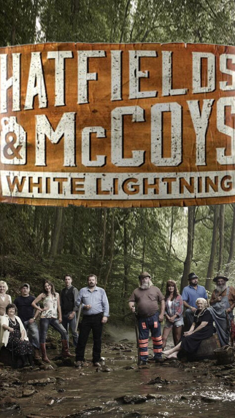 The Hatfield and McCoy families pose together on separate sides of creek with "Hatfields and McCoys: White Lightning" written across the top of the image.