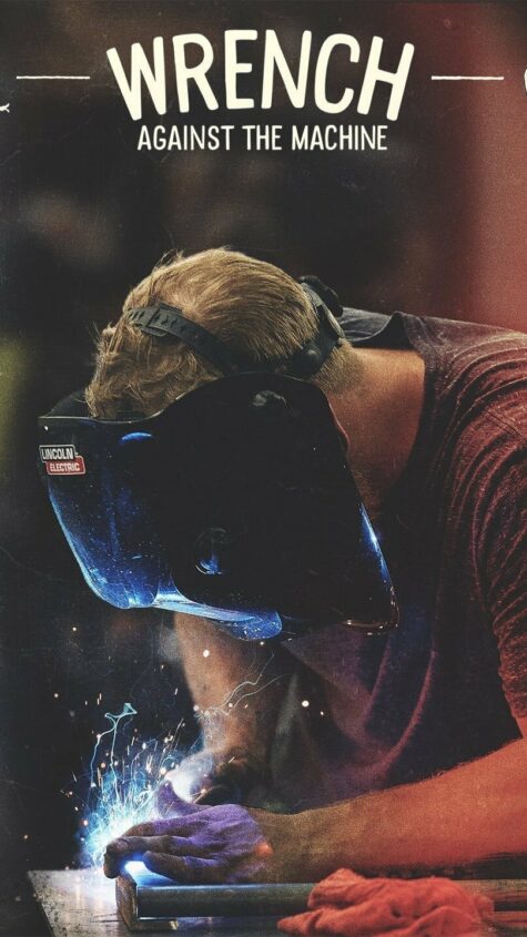 A man welds with bare hands with the words "Wrench Against The Machine" written across the top of the image.